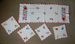 Embroidered tablecloth and placemats