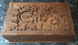 Hand-carved floral wooden box with tricky door opener