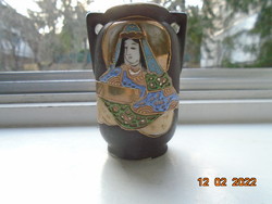 Satsuma is a small vase with a cannon with the Japanese Buddhist goddess of mercy