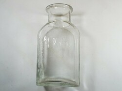 Antique old square glass bottle with the inscription 1 kilo, in the form of pints