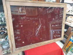 Old wooden framed glass wall display cabinet.