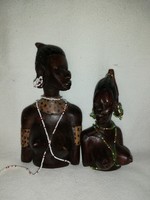 Wooden African sculpture with rows of beads
