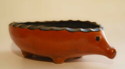 Ceramic hedgehog basket.