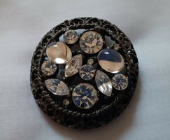 Vintage brooch (pin) decorated with polished glass