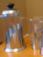 Retro glass jug in curved stainless steel holder