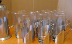 Retro drinking glasses in a curved stainless steel holder