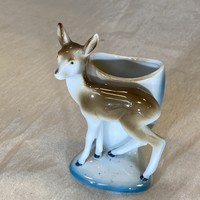 Antique porcelain vase with deer