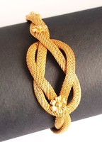 Beautiful unique 18k gold braided flower bracelet