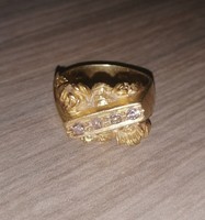 Egyedi kidolgozású 18k gyémántberakásos aranygyűrű hagyatékból eladó