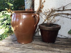 Large honey-brown green glazed earthenware pitcher with a sloppy spout