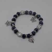 Bracelet with shambala pearls, butterfly and heart pendants