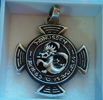 Silver dragon motif pendant