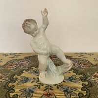 Herend's peeing putto figure is flawless