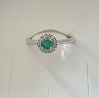 18 carat white gold ring with emeralds and diamonds!