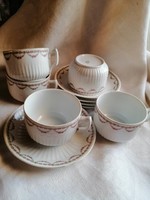 Porcelain tea cups with saucers