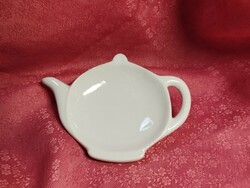 White porcelain offering a tea filter