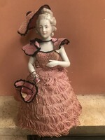 A wonderful tea doll in her original outfit