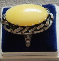 Beautiful old silver ring with egg yolk amber