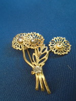Old brooch with three flower stalks