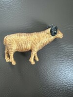 Gold-colored old ram Christmas tree ornament or nativity scene