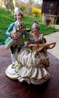 A beautiful Dresden rococo style musical couple, marked