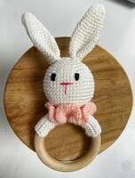 Hand crocheted bunny girl with wooden tongs
