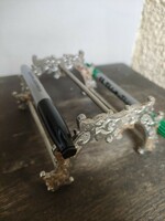Old desk, cast iron pen and pencil holder