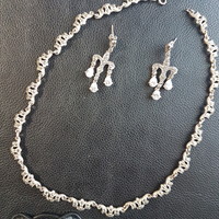 Silver antique necklaces with matching earrings. The price applies to both together.