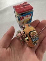 Metal pull-up pecking chick toy