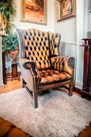 A561 antique chesterfield leather armchair with ears
