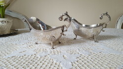 A beautiful English silver-plated sauce pouring spout on legs