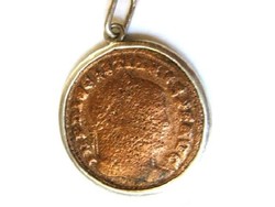 Diocletian's ancient Greco-Roman coin in a silver socket