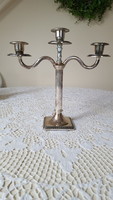 Elegant, three-pronged silver-plated candle holder