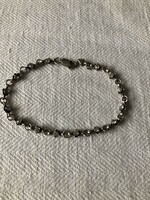 Silver bracelet with stones