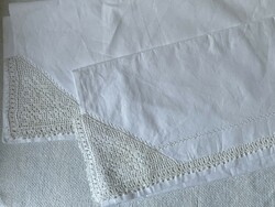 Crisp, uninitiated, snow-white, crocheted linen cushion covers