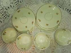 Porcelain, butter-colored tea... 6 plates, 4 cups.