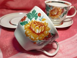 Beautiful porcelain coffee cup with saucer