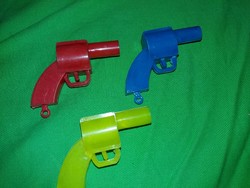 Old tobacconist's bazaar goods, Hungarian plastics, tiny pistols, whistles together, as shown in the pictures