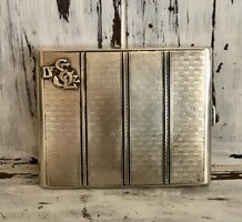 Special, monogrammed, delicately decorated silver wallet