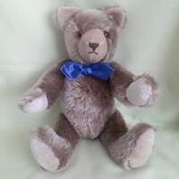 Classic plush teddy bear, wooden disc, glass eyed, humming teddy bear (not small)