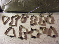 11 old cookie cutters with hangers