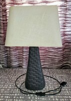 Art deco bedside lamp with a braided pattern and a ceramic body
