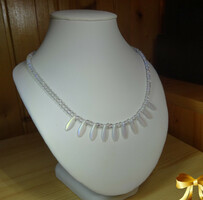 Necklaces made of quality AB Czech pearls.