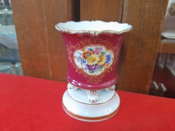 German Meissen flower-patterned gilded, hand-painted porcelain pot with legs.