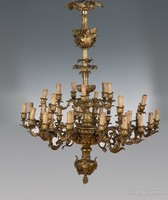 Gilded bronze 18-arm chandelier - with faun heads