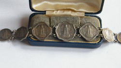 A bracelet made of 60-year old coins!