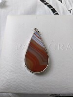 Beautiful new, healing agate pendant in a silver-colored metal socket
