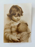 Old postcard photo postcard with a small child's teddy bear