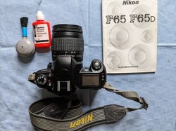 Nikon f65 SLR camera (film) with af nikkor 28-80 mm 1:3.3-5.6g lens