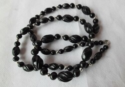 Retro black string of beads, with silver spacers